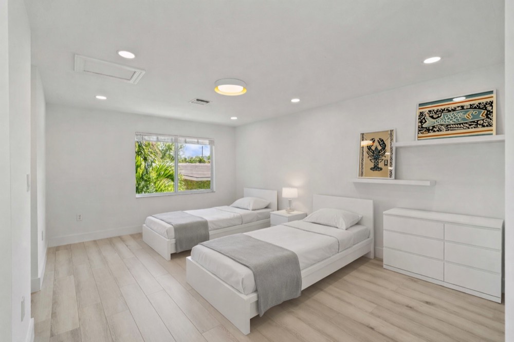 Bright bedroom with two twin beds