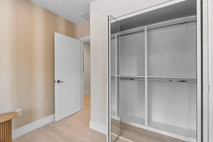 Custom closet with glass shower